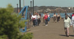 People walk along the Halifax waterfront Oct. 4 2023