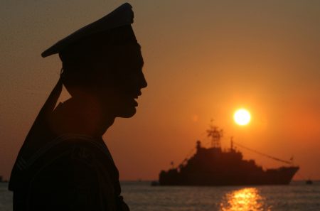 sailor watches sunset