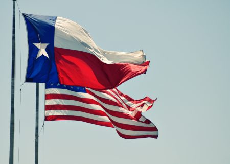 texas flag alongside us state flag