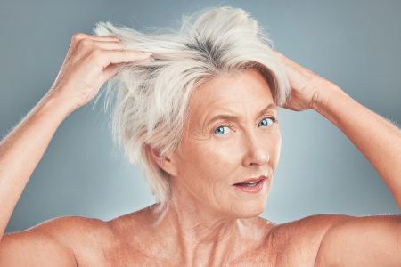 older woman messy grey hair